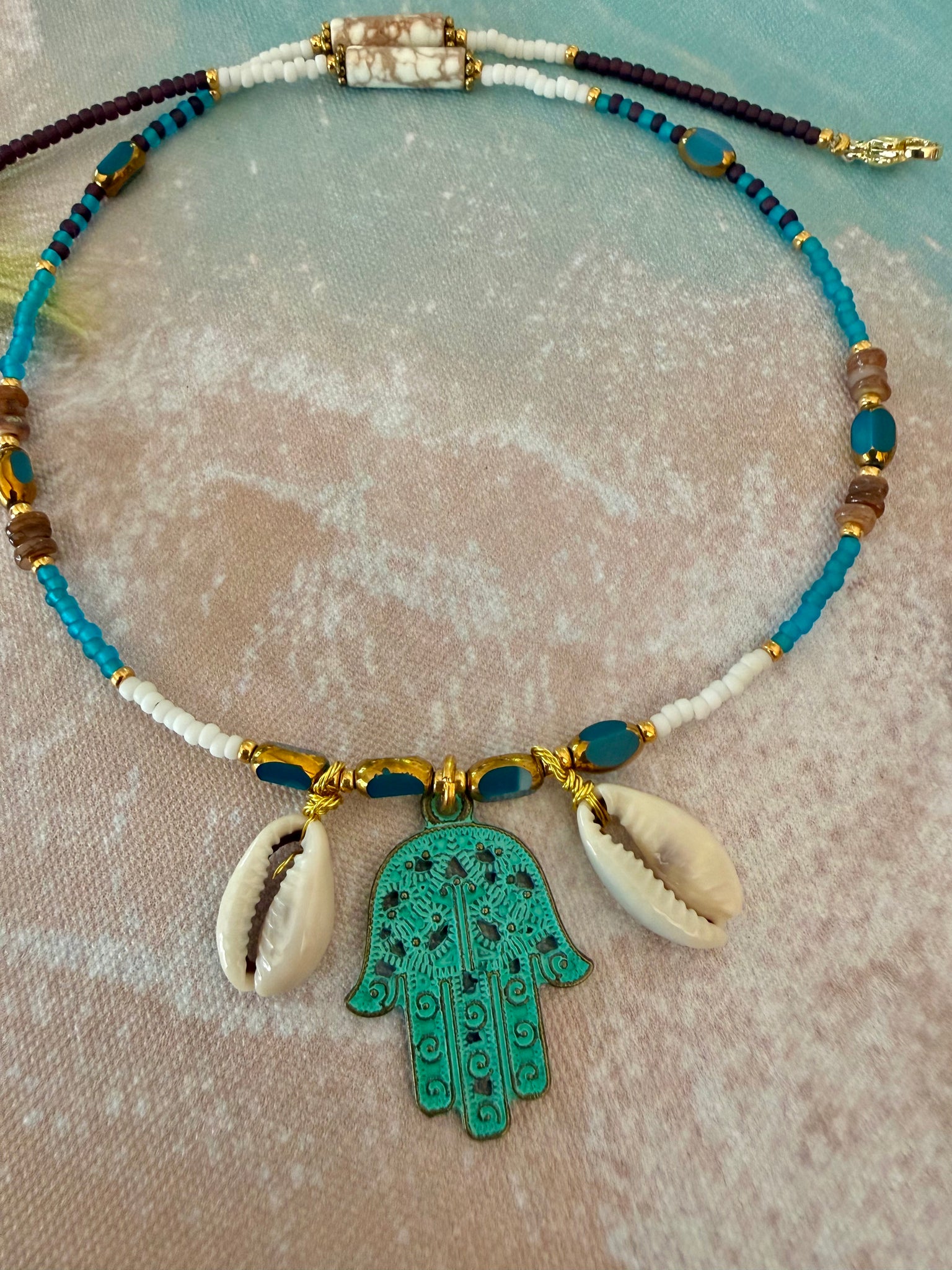 Hasma Hand Cowrie Shell Seed Bead Necklace